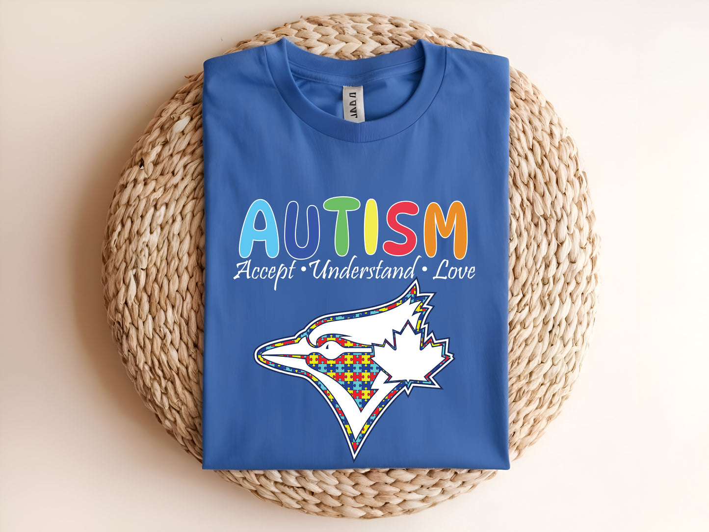 Adult graphic t-shirt featuring “Autism Accept Understand Love” message, unisex awareness tee promoting support and inclusion.