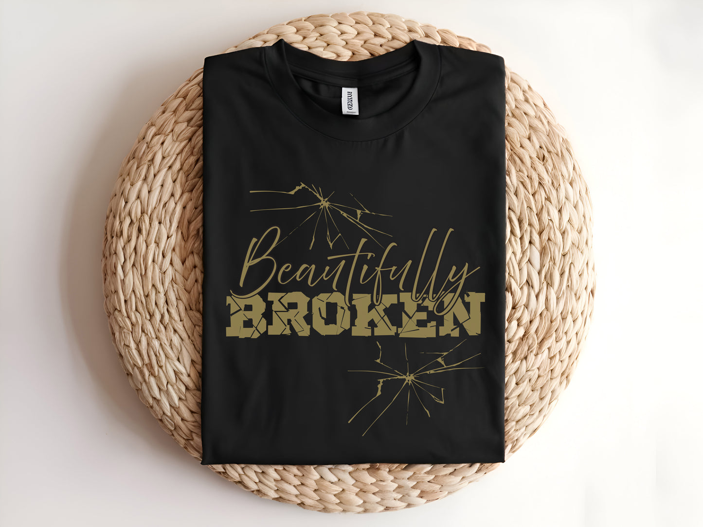 Adult graphic t-shirt featuring “Beautifully Broken” slogan, unisex tee with inspirational message for everyday wear.