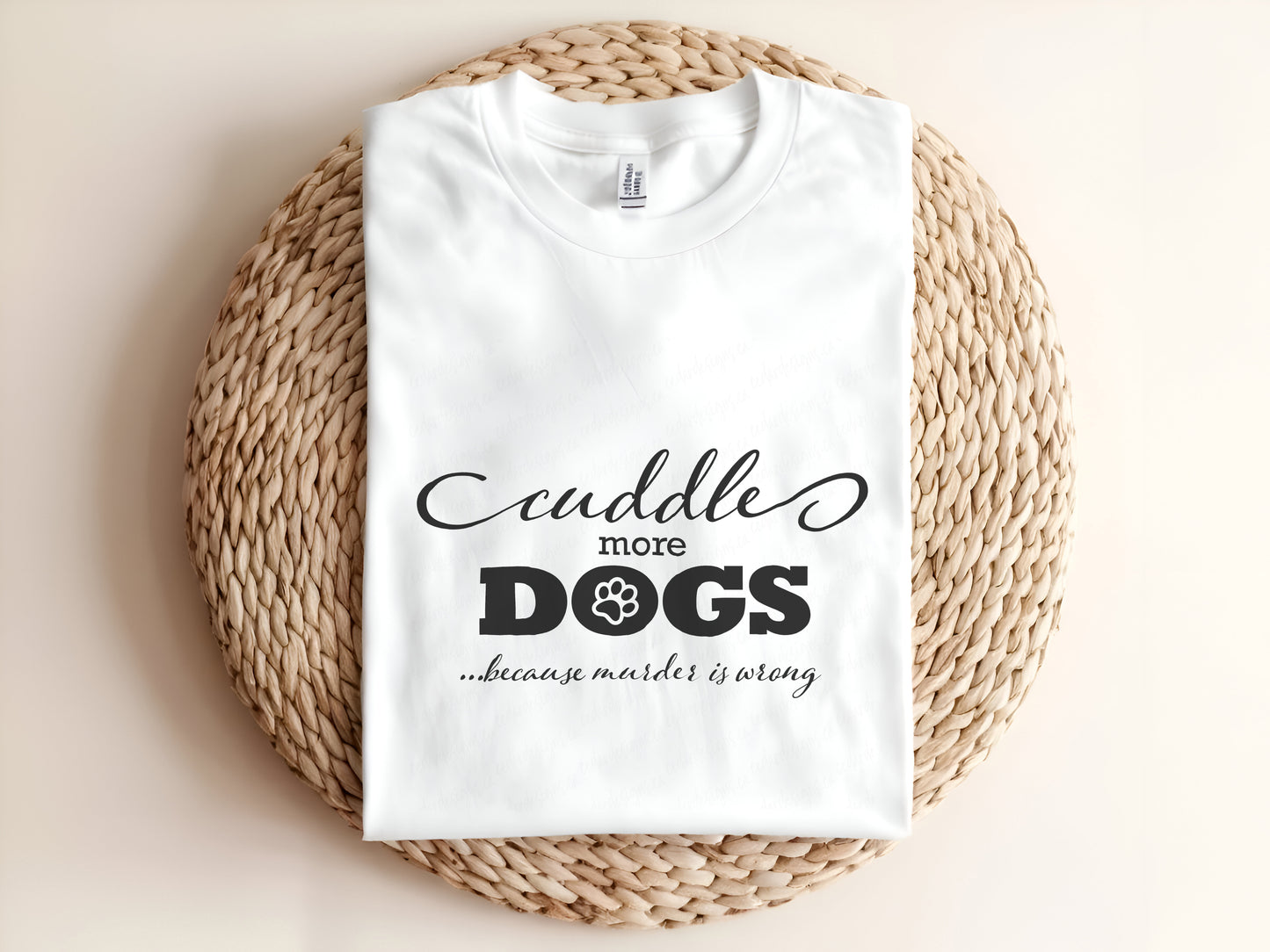 Adult graphic t-shirt featuring “Cuddle More Dogs Because Murder Is Wrong” slogan, humorous unisex tee.