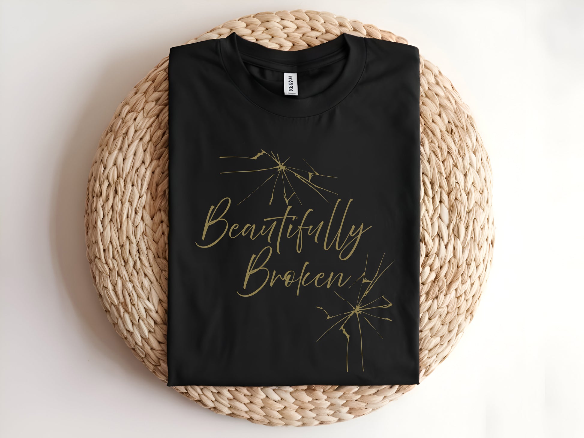 Adult graphic t-shirt featuring “Beautifully Broken” slogan, unisex tee with inspirational message for everyday wear.
