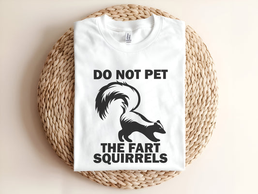 Adult graphic t-shirt featuring “Do Not Pet The Fart Squirrels” slogan, funny unisex novelty tee.