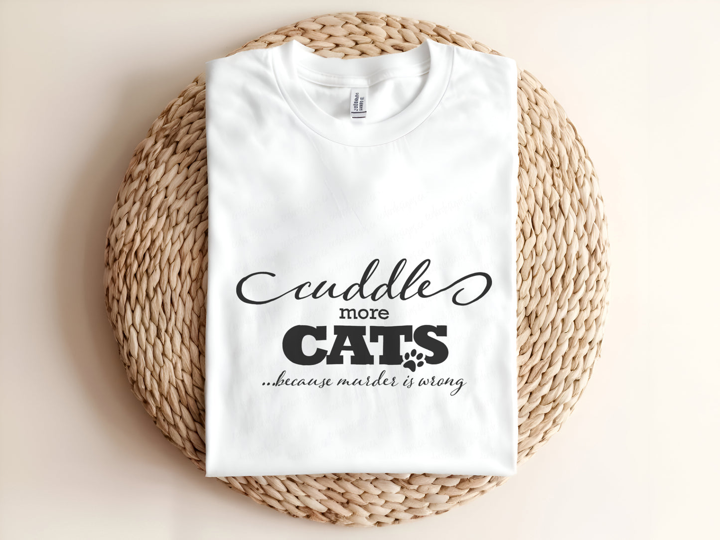Adult graphic t-shirt featuring “Cuddle More Cats Because Murder Is Wrong” slogan, humorous unisex tee for cat lovers.